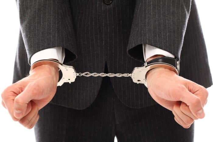 A man got his hand bounded by a pair of handcuff