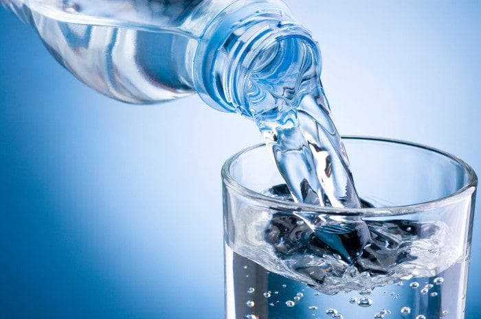6 Principles Of A Modern Optometry Website Design 2 Water Pours From A Bottle To A Glass.