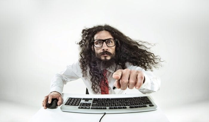 A geek is using a keyboard