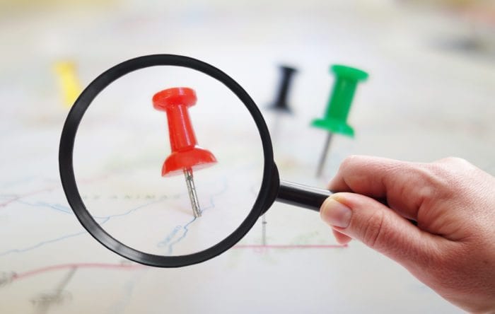 Pin In A Map Under A Microscope Referring To Local Medical Marketing