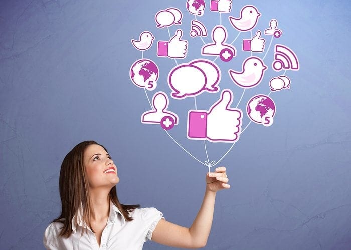 Woman Holding a network of social media showing importance in medical websites