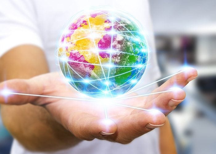 Hand Holding the world showing network of servers for website hosting