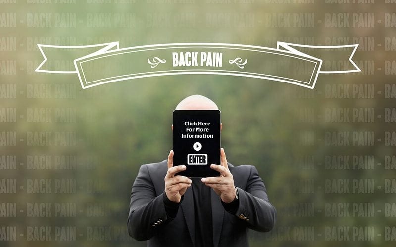 Man holding enter sign for back pain