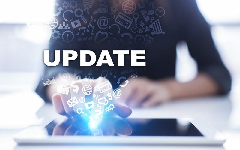 Optimize Your Optometry Website 2 Woman Pushing The Button On Tablet To Update