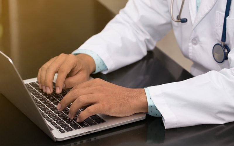 Doctor on his laptop