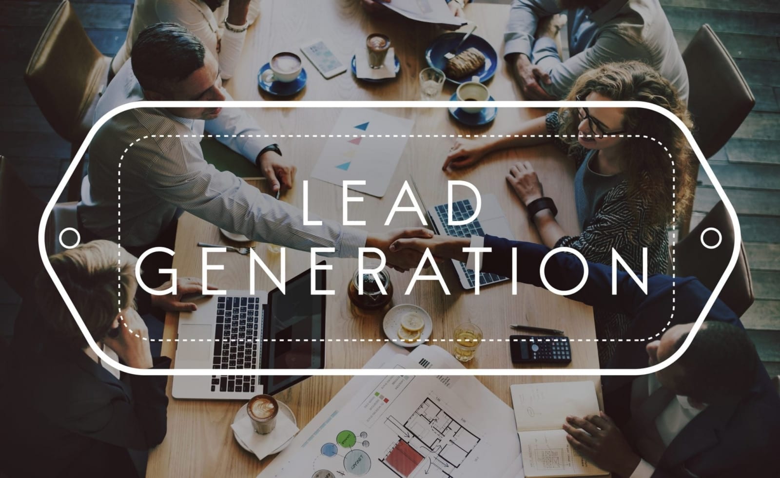 Image of professionals seated around a table working with words "Lead Generation" imposed over the image